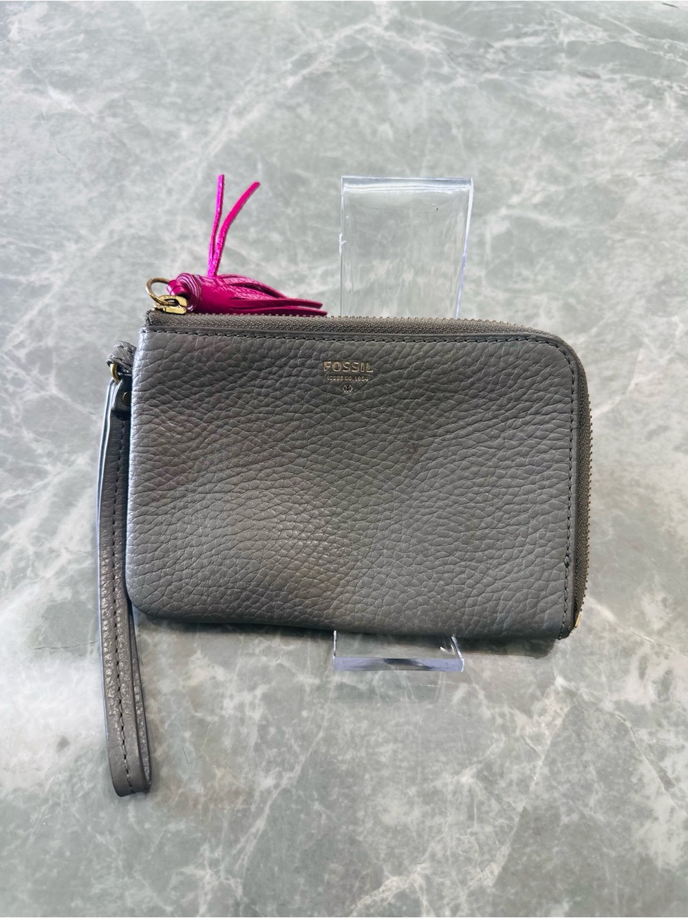 Fossil Gray Pebbled Leather Wristlet with Pink Tassel Accent